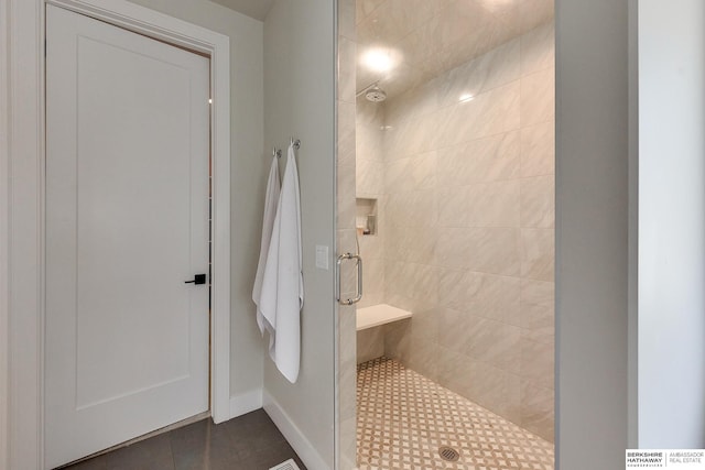 bathroom featuring tile patterned floors and walk in shower