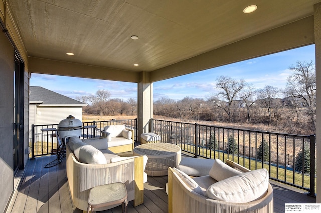 deck featuring outdoor lounge area