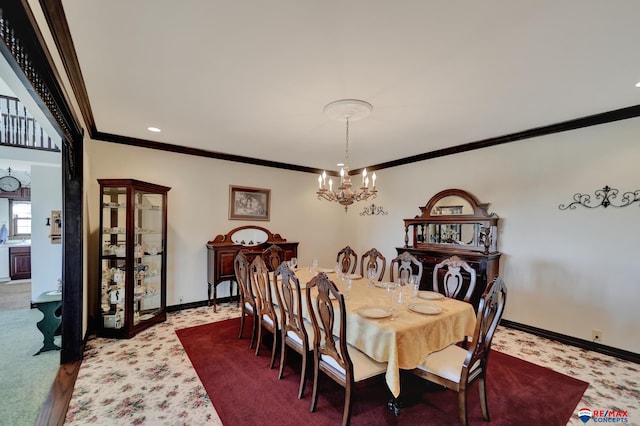 dining room with baseboards, a notable chandelier, and ornamental molding