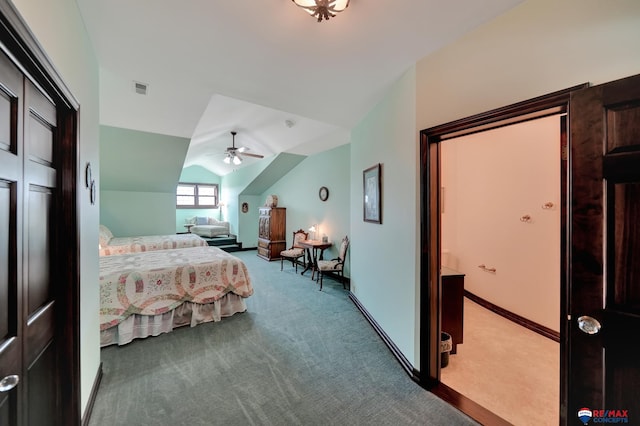 bedroom with lofted ceiling, light colored carpet, visible vents, ceiling fan, and baseboards