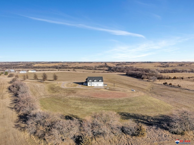 birds eye view of property featuring a rural view