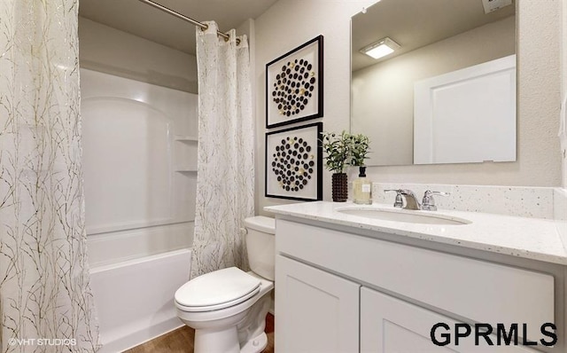 full bathroom featuring vanity, toilet, and shower / bath combo with shower curtain