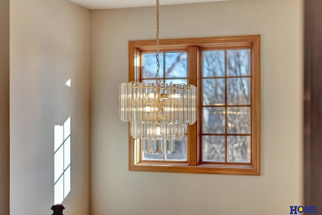 interior details with an inviting chandelier