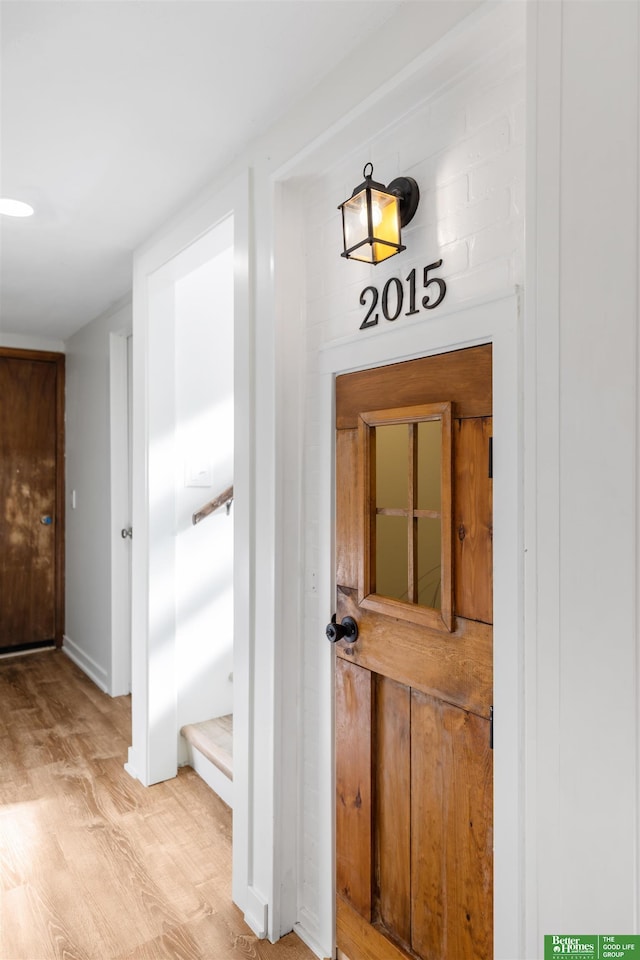 hallway featuring light hardwood / wood-style floors