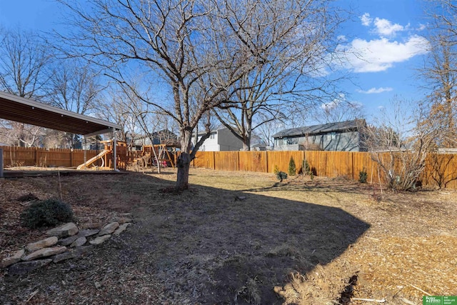 view of yard with a playground