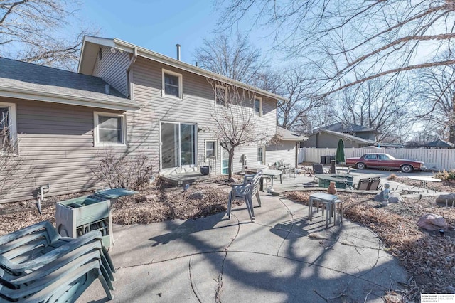 back of house with a patio area