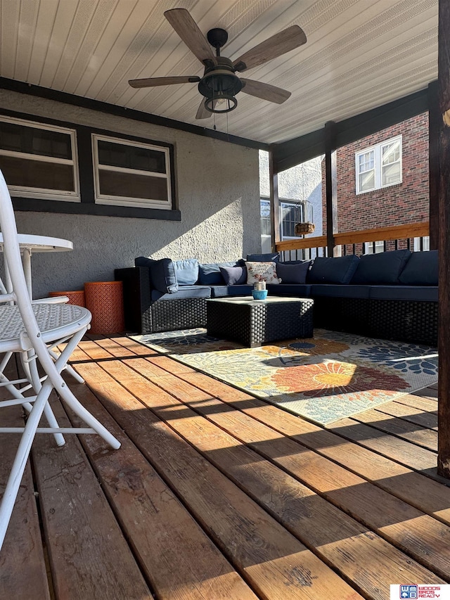 view of patio featuring ceiling fan and an outdoor living space