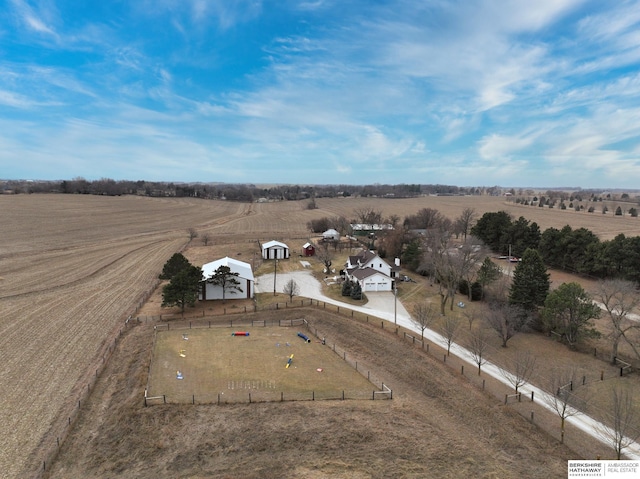 birds eye view of property featuring a rural view