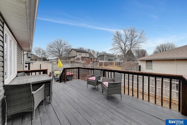 deck featuring a storage shed