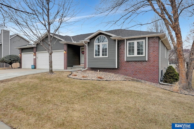 ranch-style home featuring a garage and a front yard