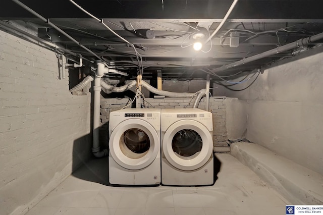 laundry room with washer and dryer