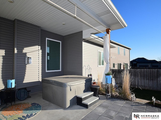 view of patio featuring a hot tub