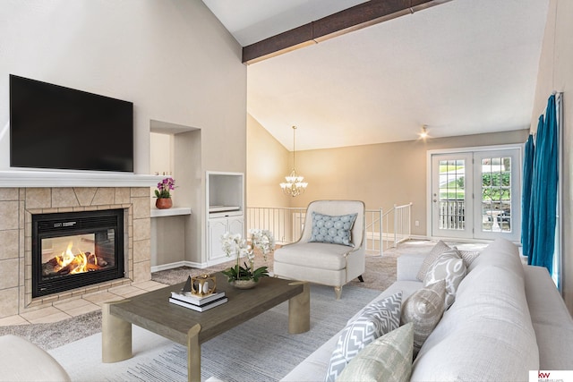 carpeted living room featuring beamed ceiling, a tile fireplace, high vaulted ceiling, and a chandelier