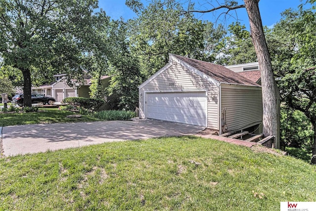 garage with a lawn