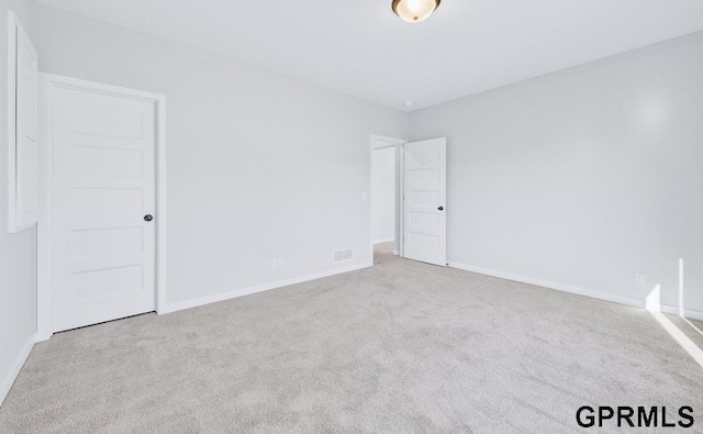 view of carpeted spare room