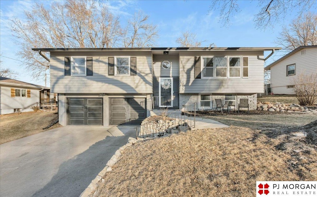 bi-level home featuring a garage