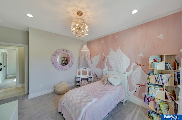 carpeted bedroom featuring a notable chandelier