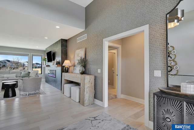 interior space with light hardwood / wood-style flooring