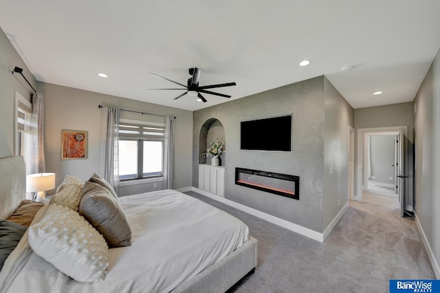 carpeted bedroom featuring ceiling fan