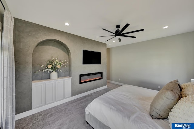 carpeted bedroom with ceiling fan