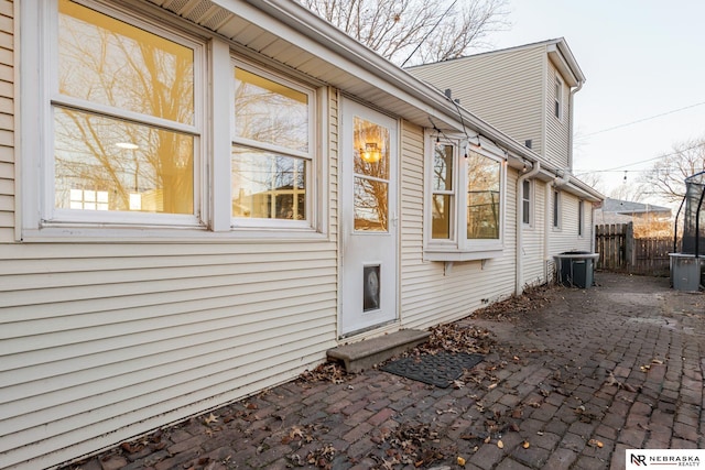 view of property exterior with a patio