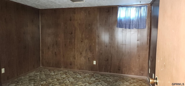 empty room with wooden walls