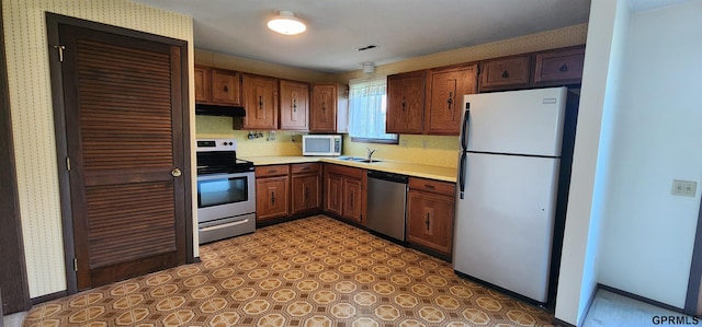 kitchen with stainless steel appliances and sink