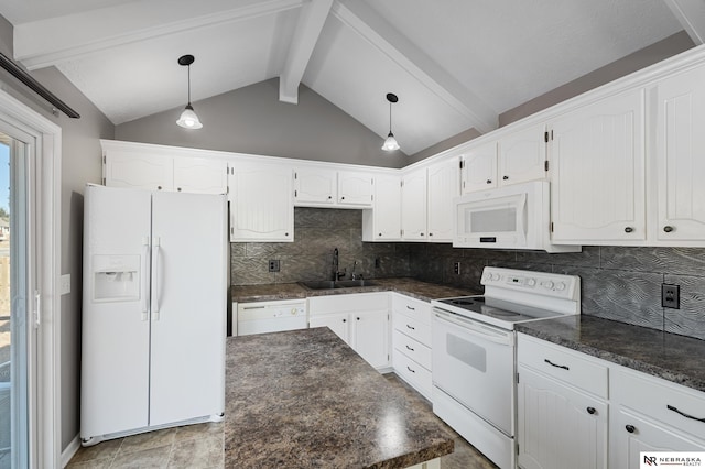 kitchen with white appliances, sink, and white cabinets