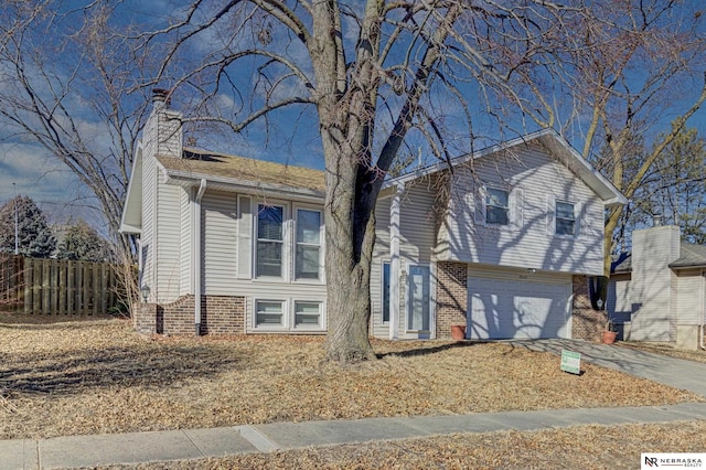 view of front of property with a garage