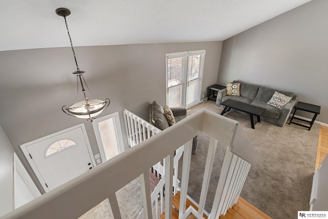 living room with high vaulted ceiling