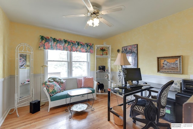 office space with ceiling fan and light wood-type flooring