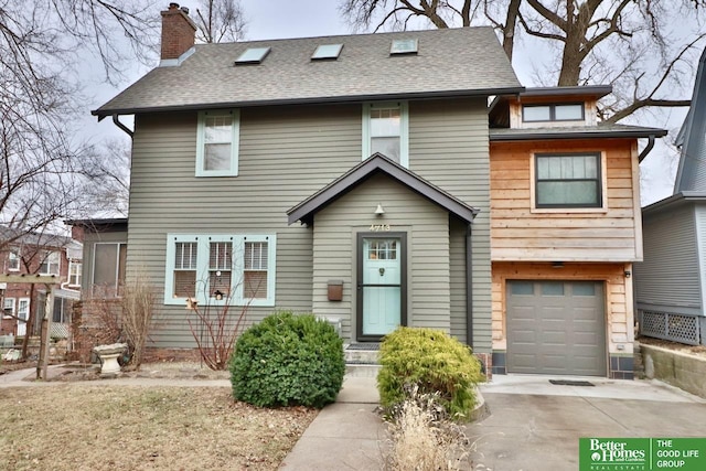 view of front of property with a garage