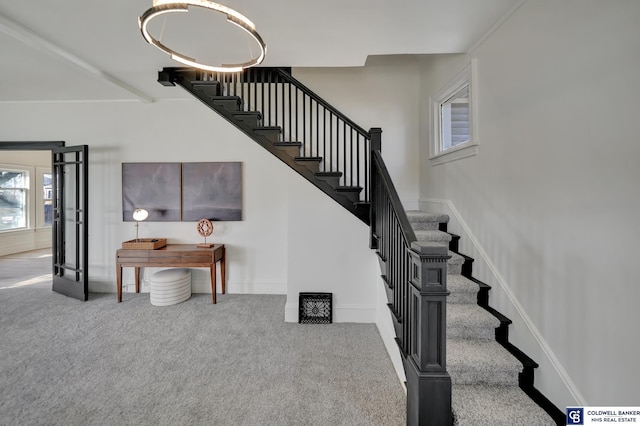 staircase with carpet flooring