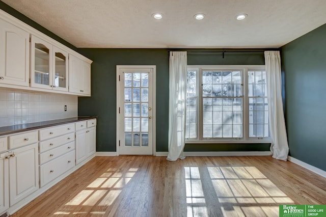 doorway to outside with light hardwood / wood-style flooring