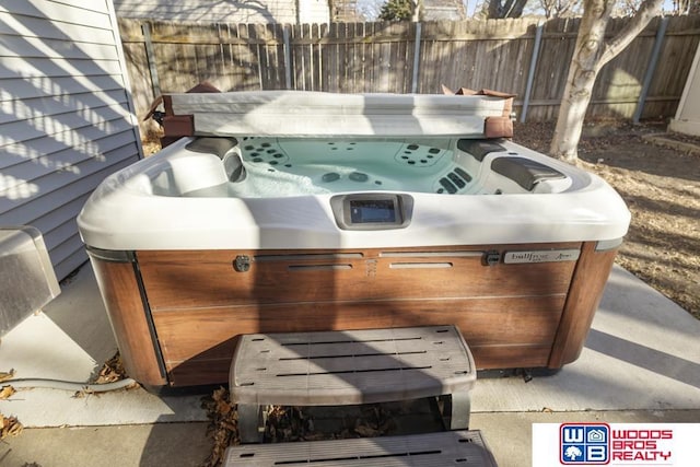 view of patio with a hot tub