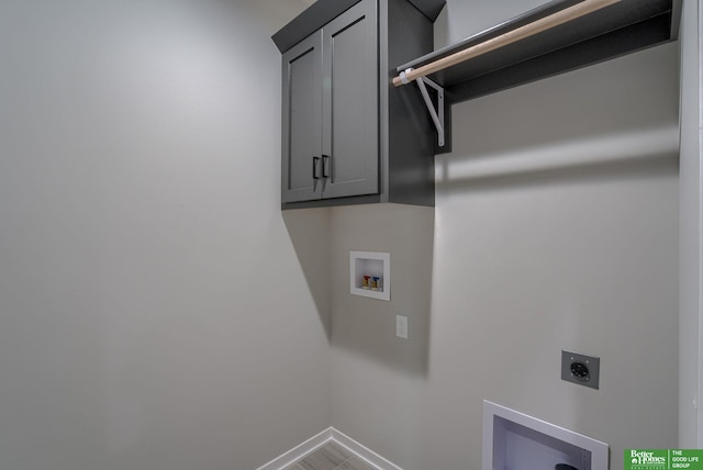 laundry area featuring cabinets, washer hookup, and hookup for an electric dryer