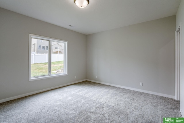 spare room with carpet flooring