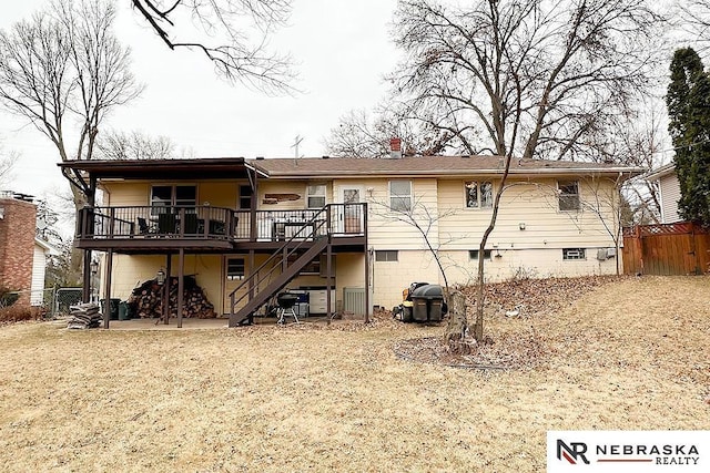 rear view of property with a deck