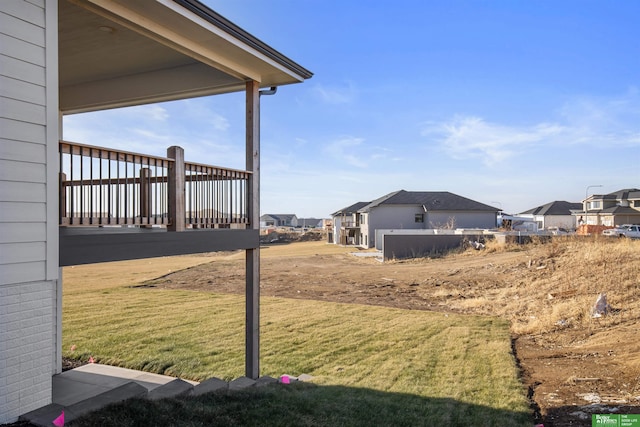 view of yard with a wooden deck