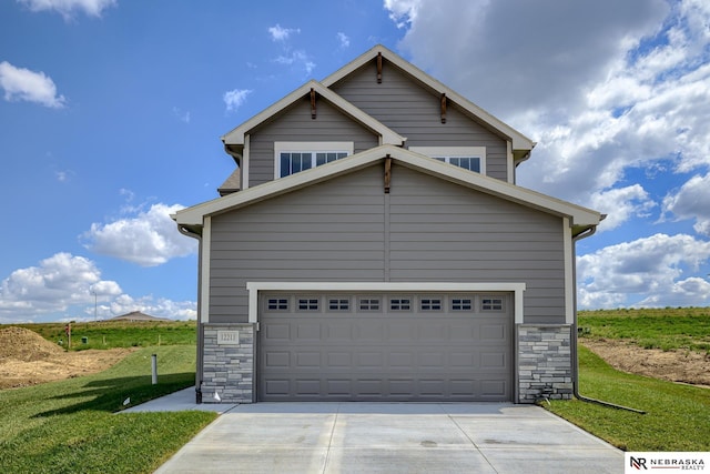 garage featuring a yard