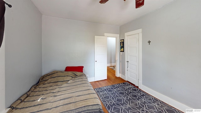 bedroom featuring ceiling fan and hardwood / wood-style floors