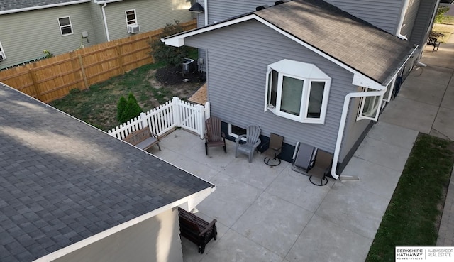 exterior space featuring central AC unit and a patio area