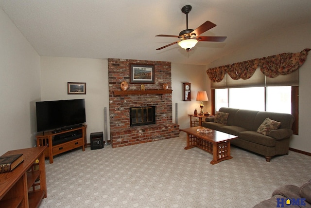 living room featuring baseboards, lofted ceiling, ceiling fan, carpet, and a brick fireplace