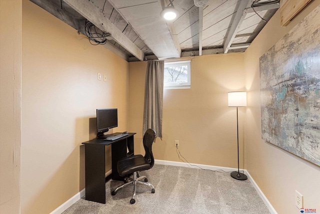 office space with beamed ceiling, carpet floors, and wooden ceiling