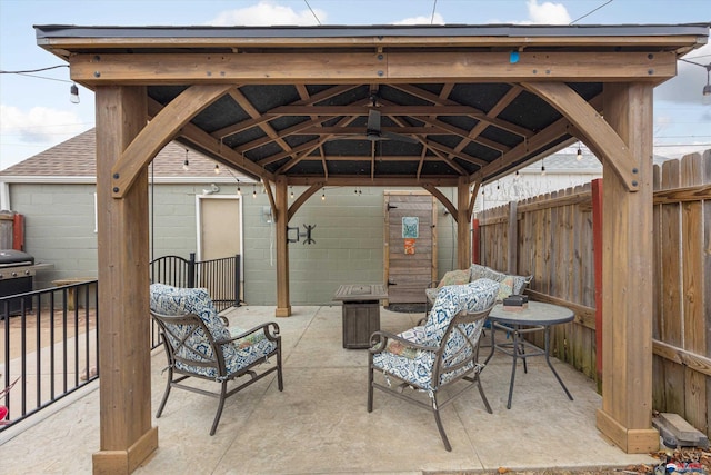 view of patio featuring a gazebo and grilling area