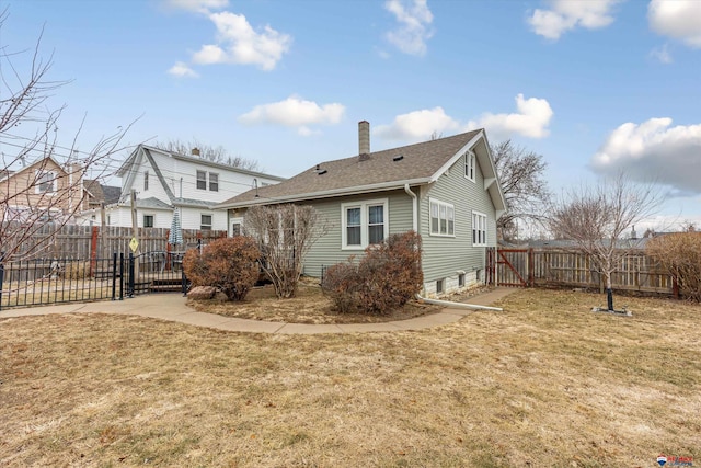 view of home's exterior with a yard