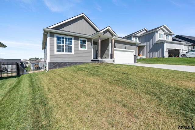 view of front facade featuring a garage and a front yard