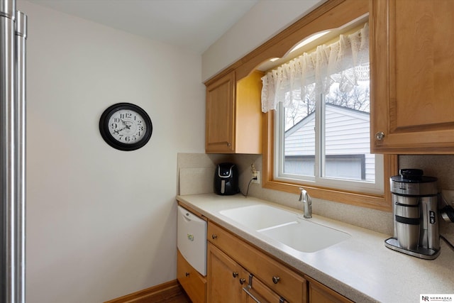 kitchen with tasteful backsplash and sink