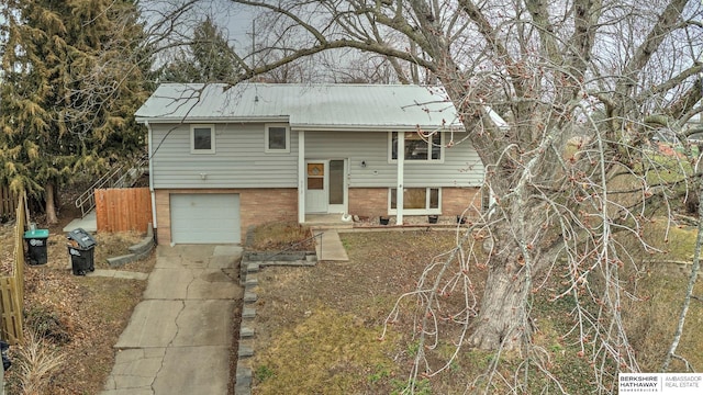 split foyer home featuring a garage