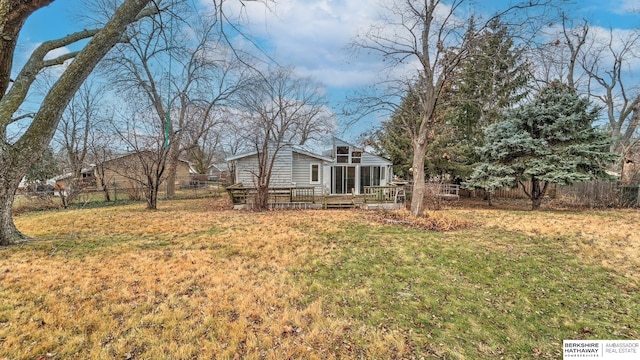 view of yard with a wooden deck